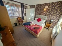 Lovely specious double room. Very quiet with perfect location opposite the train station.