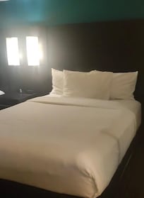 Quarto/suíte com duas camas queen