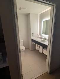 Nice size bathroom with plenty of counter space, shower, tub & plenty of towels.