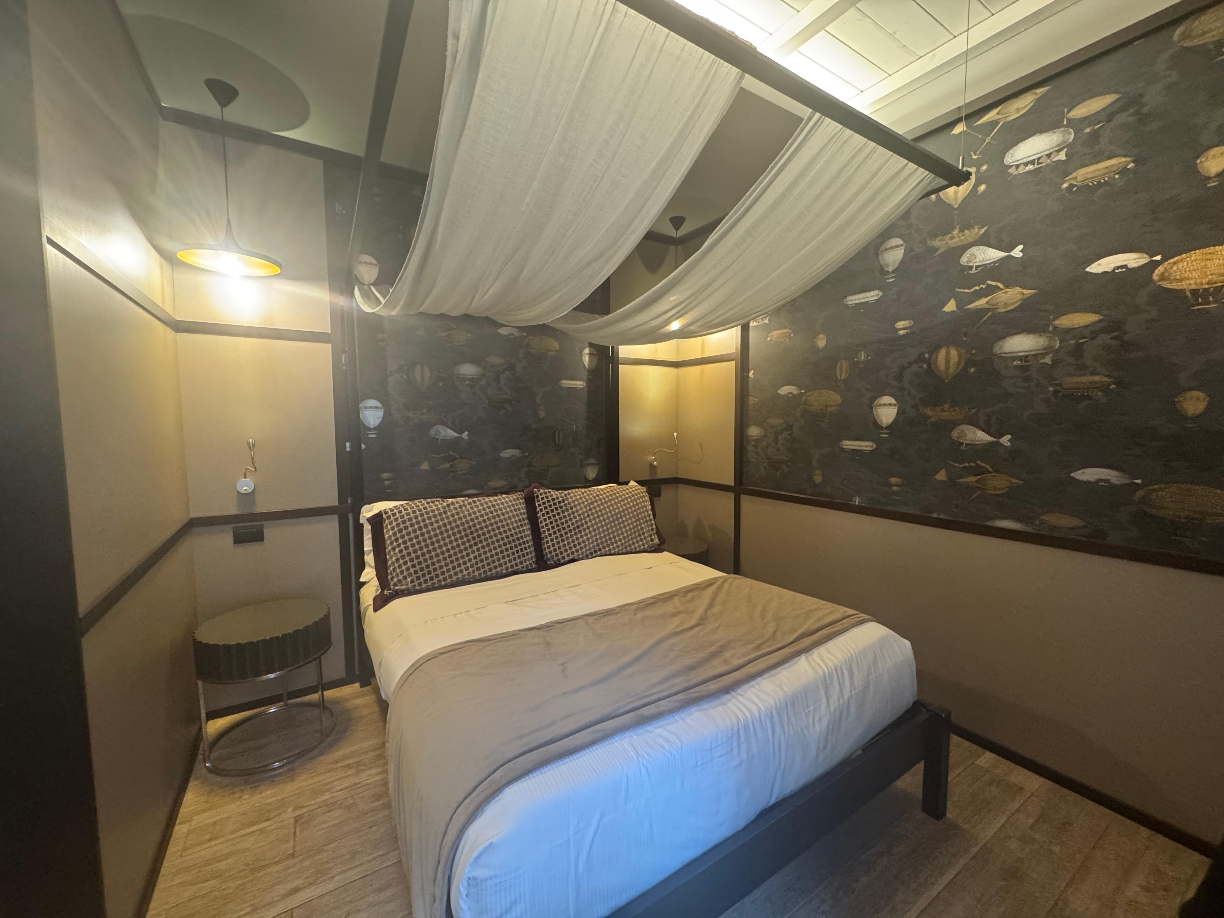 Only the bed area not showing the desk, coffee nook and rest of the room. 