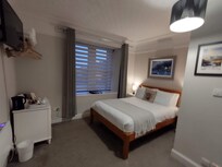 No seating or surface to put anything. No closet but hangers above the kettle