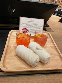 Welcome mocktail and refreshing towels