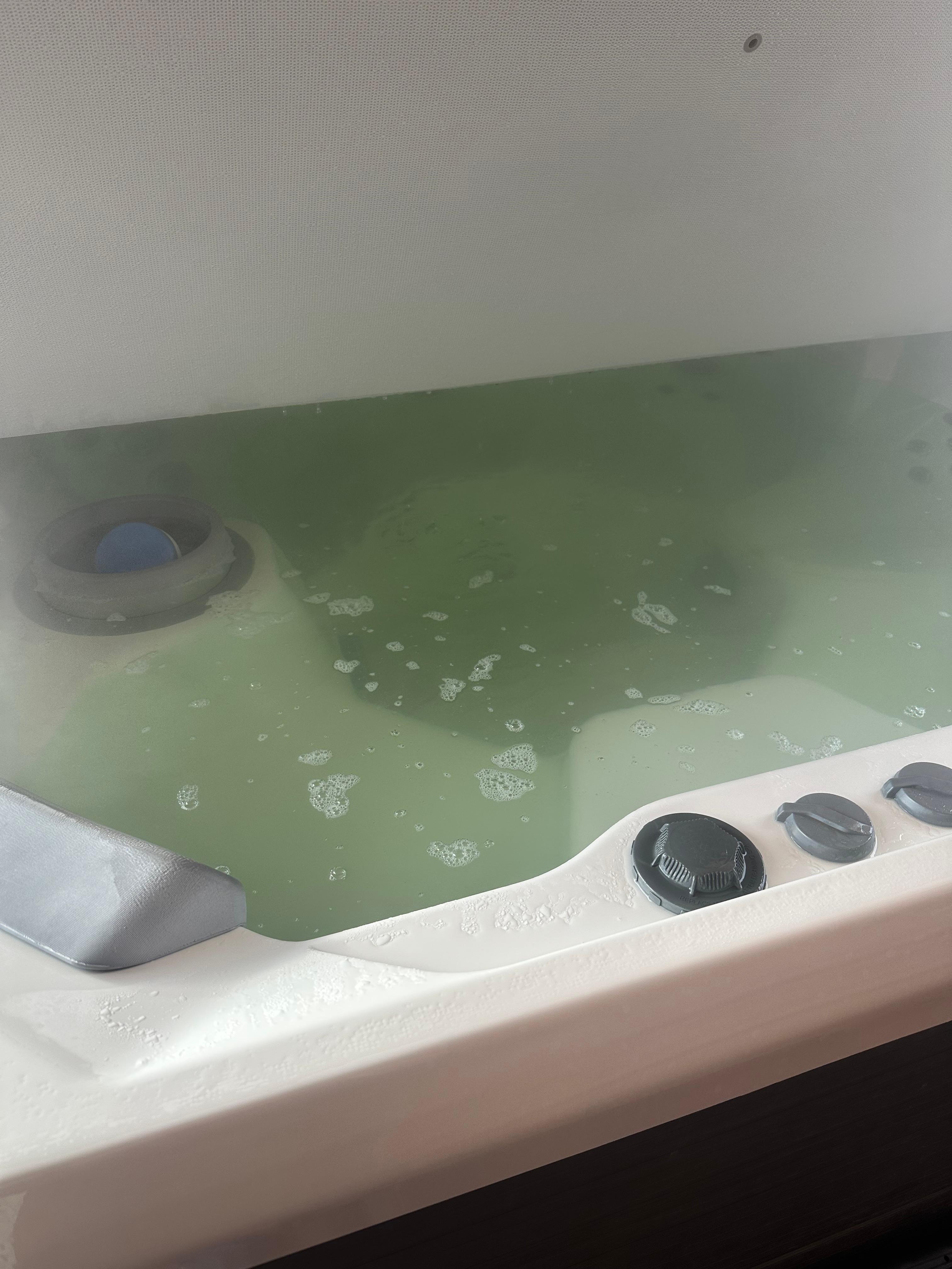 Green hot tub water