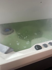 Green hot tub water