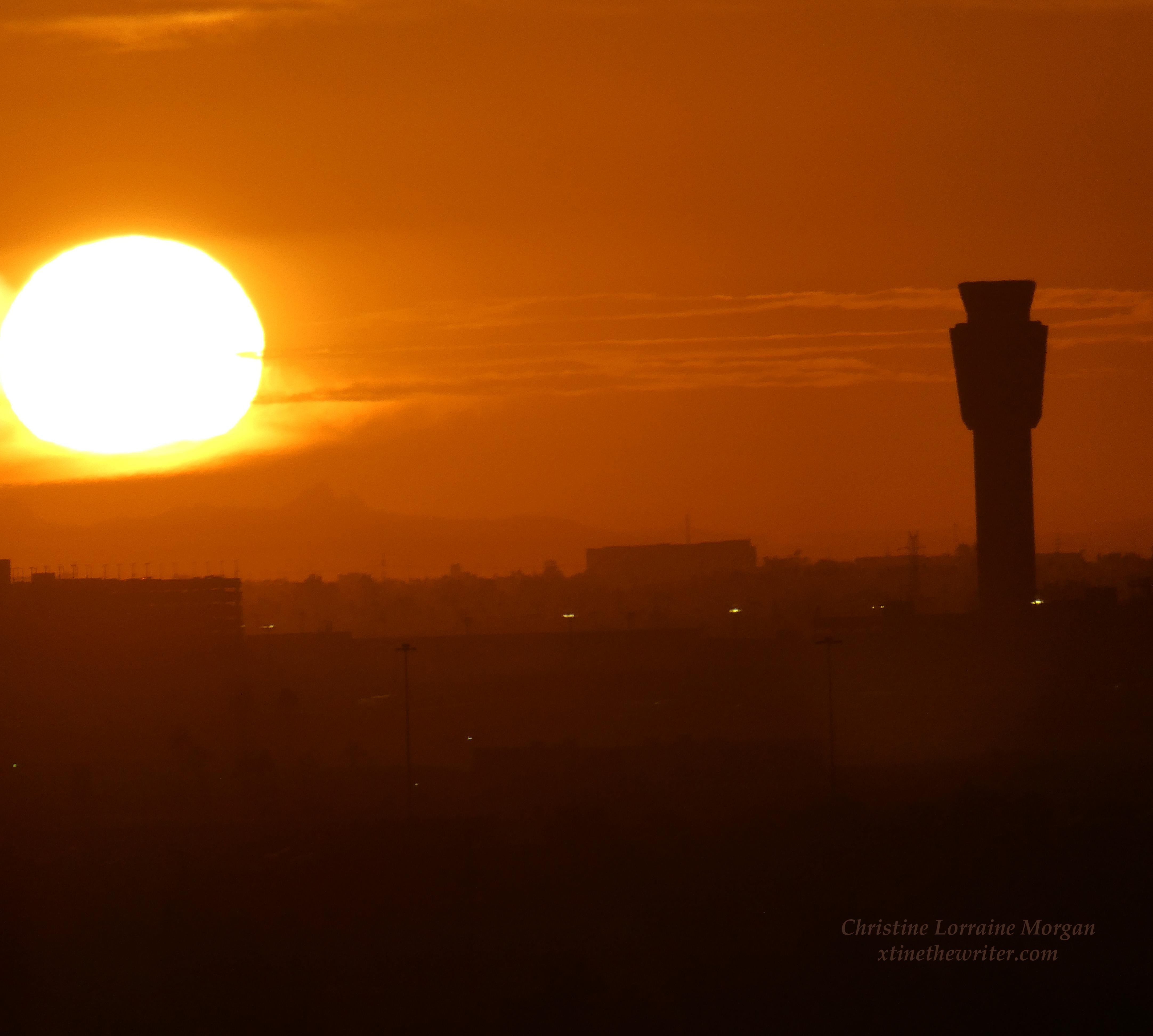 Sunrise over Phoenix photographed with Lumix 11/12/2025 from 14th floor window