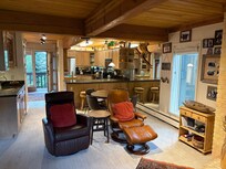 Dining/kitchen looking towards front door.