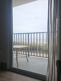 View of the balcony and beach.