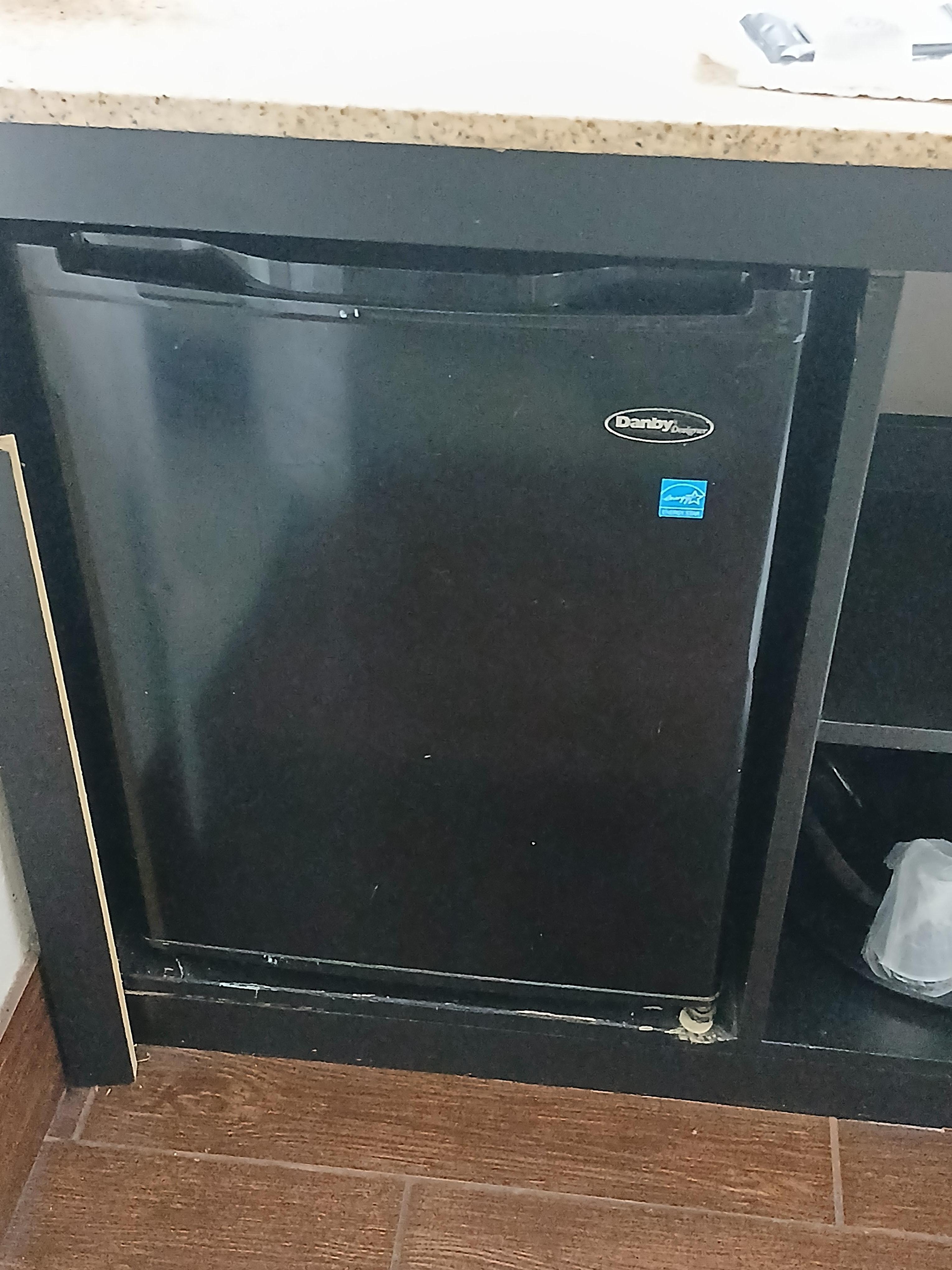 Nasty fridge.  I didn't bother opening it. 