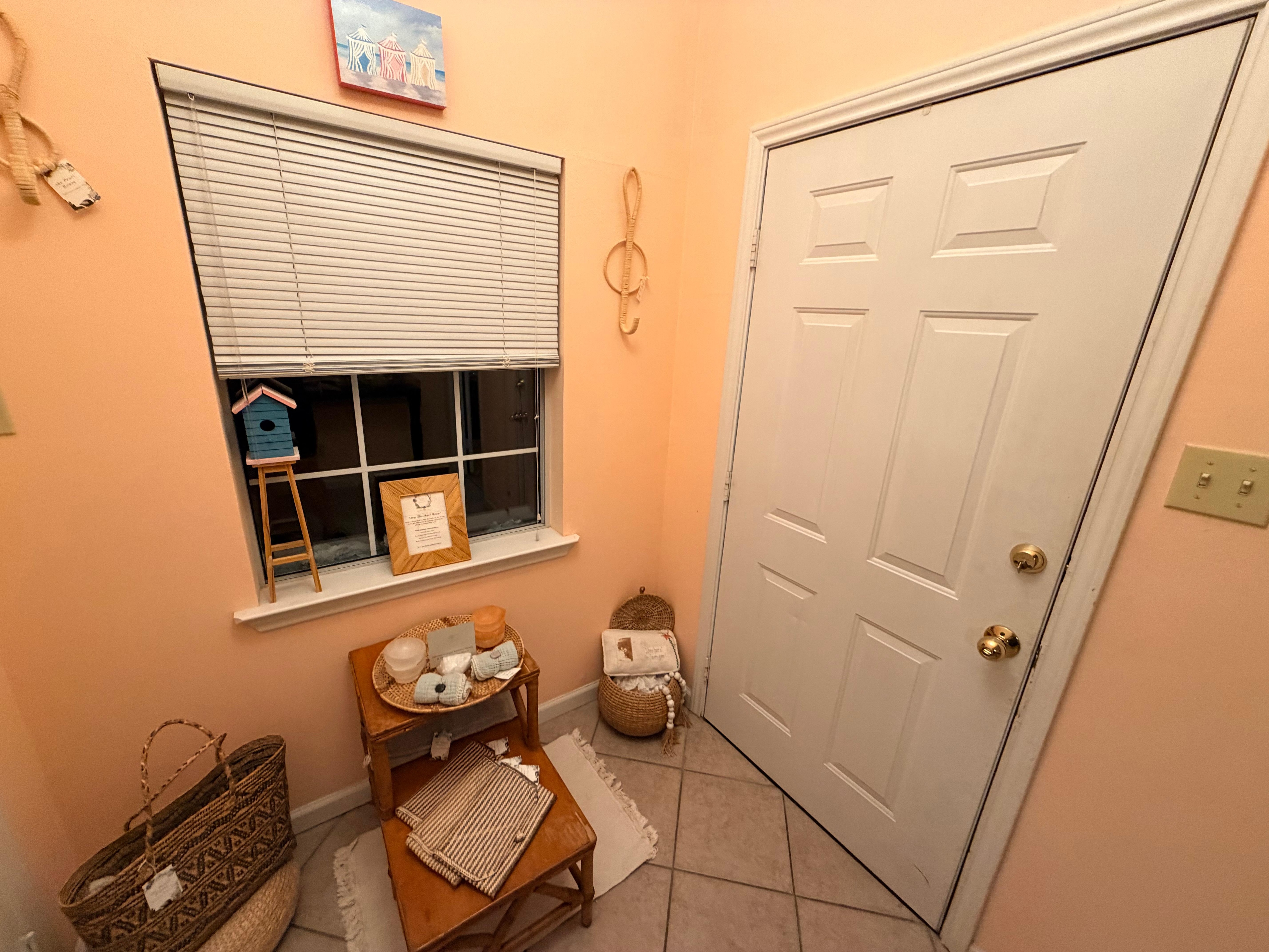 Stuff crowding the door that is for sale. 