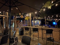 Food truck and bistro area at center of property