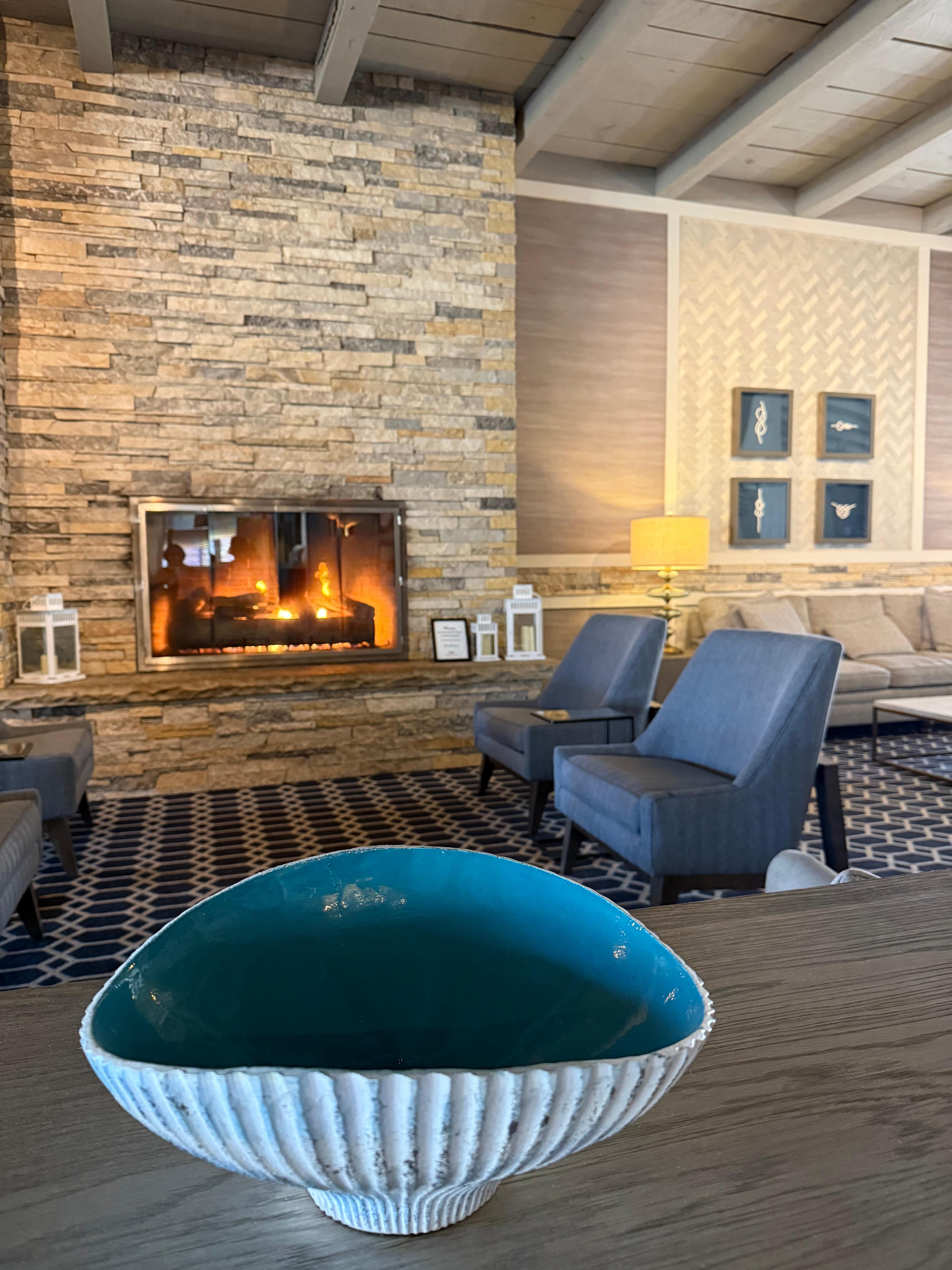 Relaxing seating are with the fireplace 