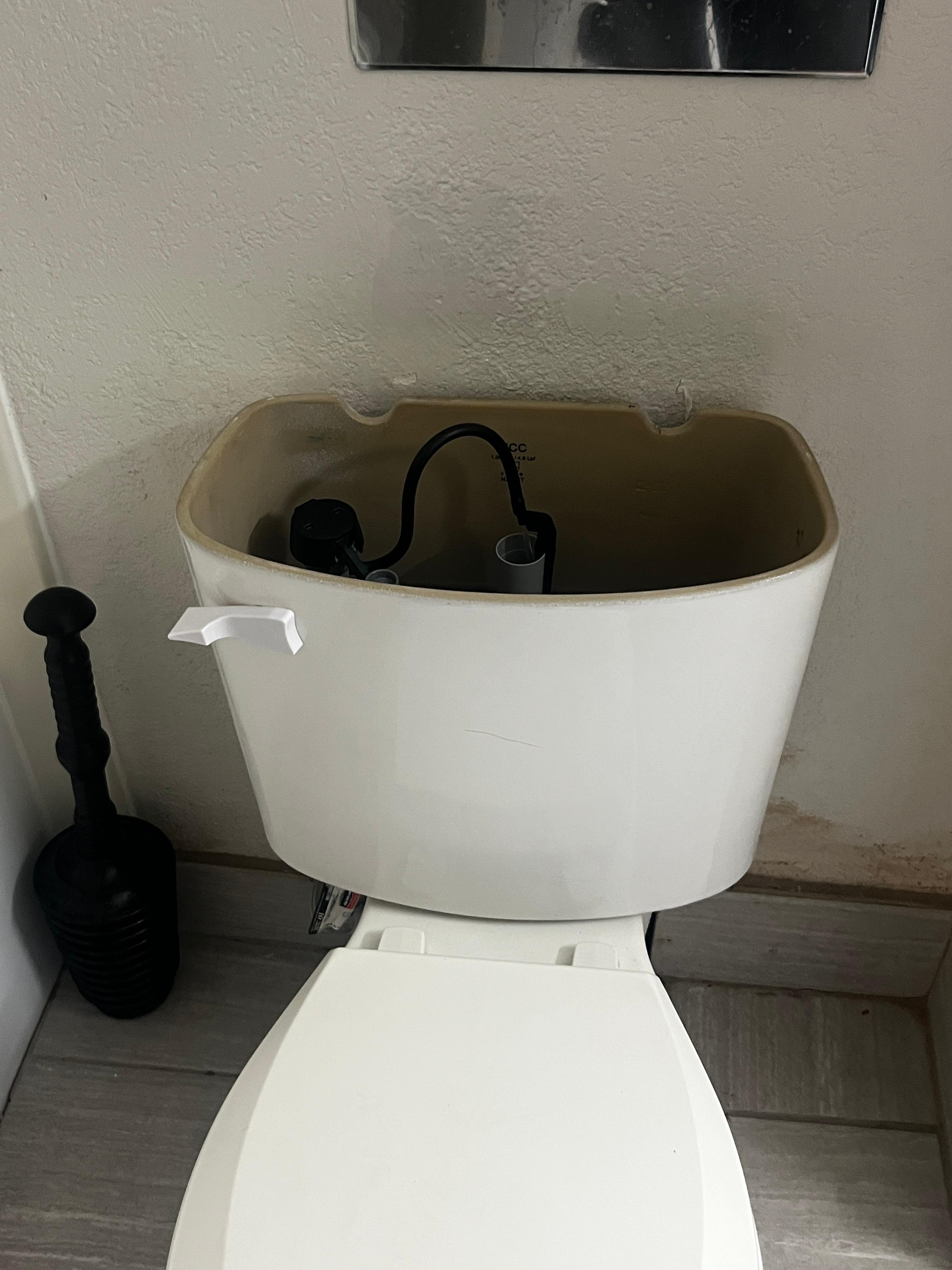 Toilet top missing. No TP