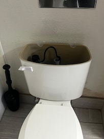 Toilet top missing. No TP