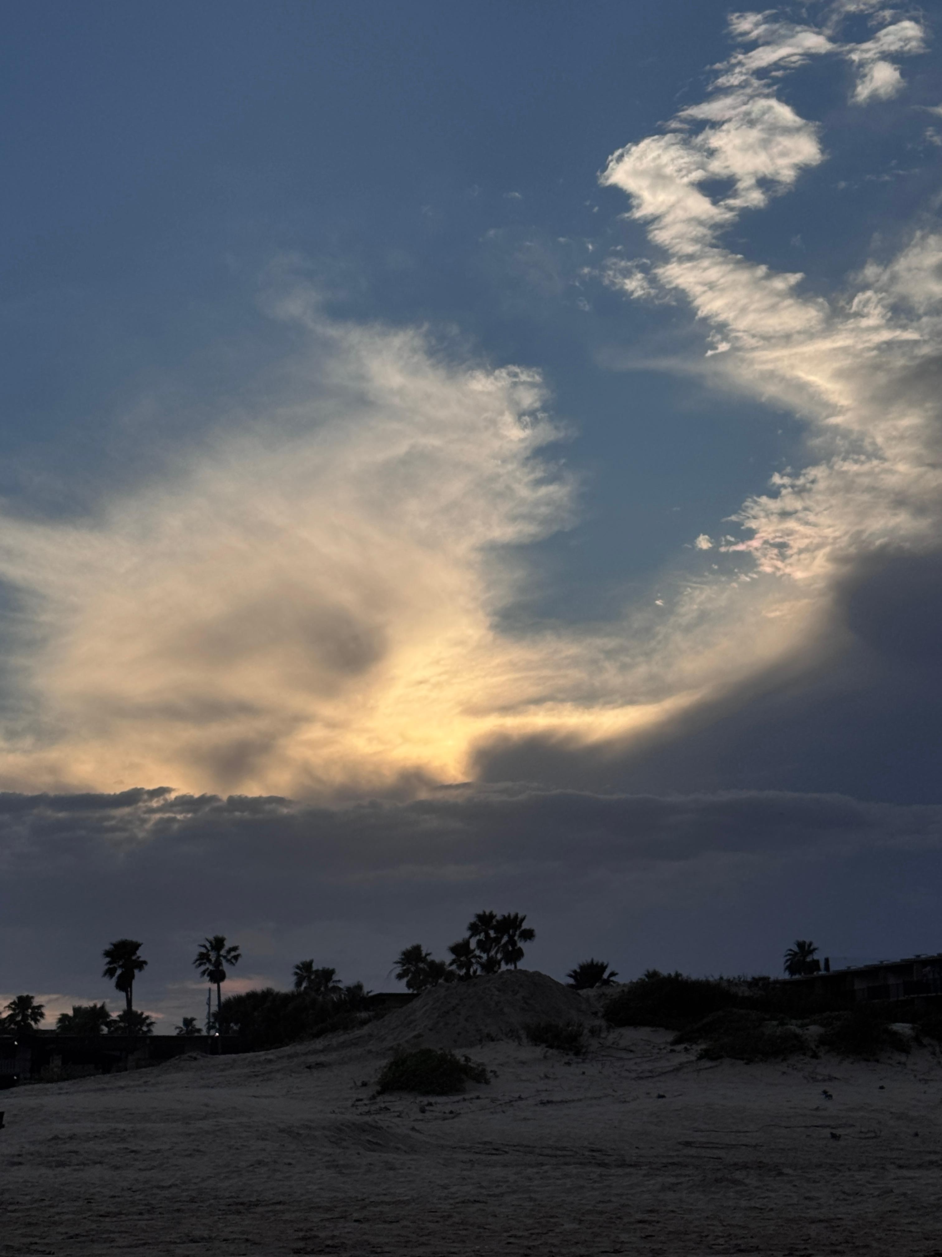 Sunset from beach right next to complex around 7:14pm on the 2nd week of April