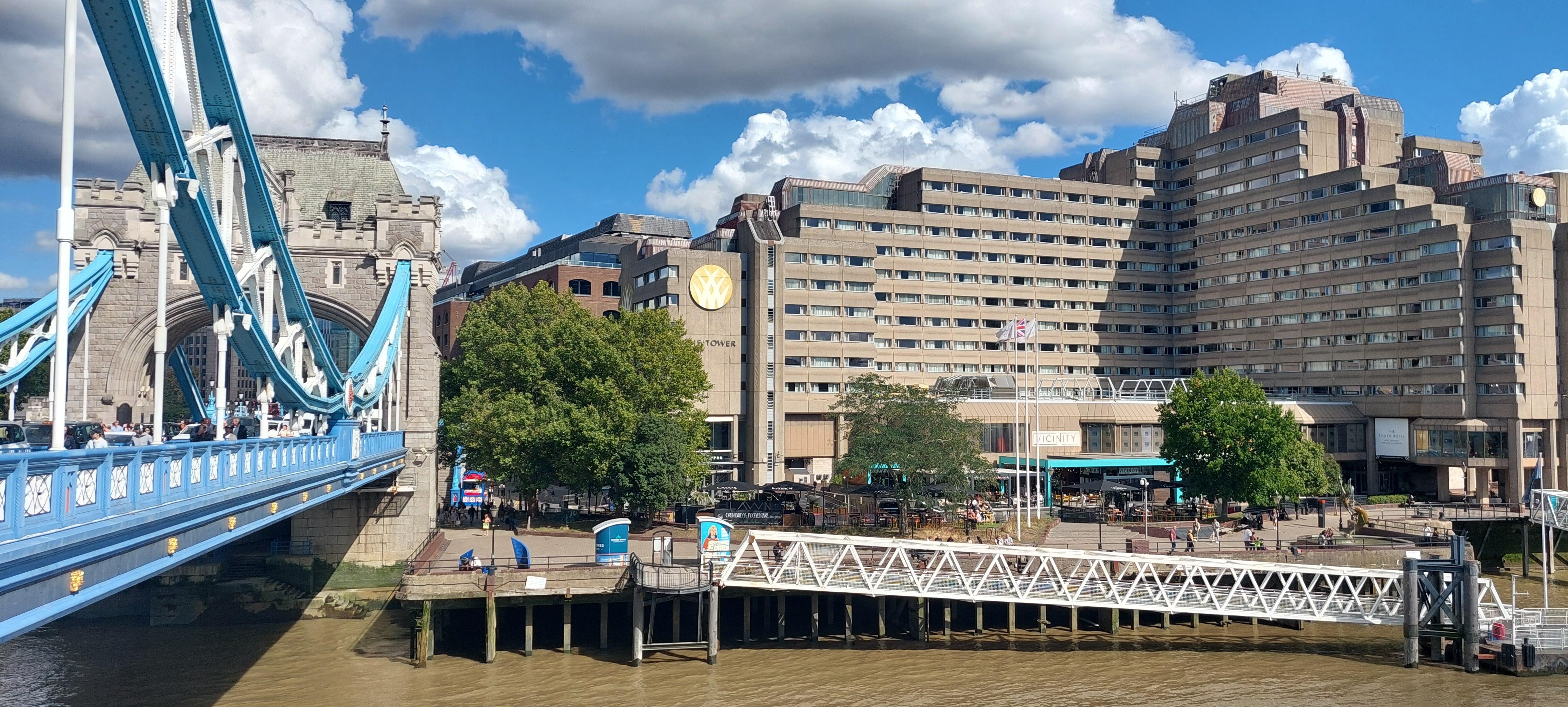 The Tower Bridge to the left. The Tower Hotel to the right. Entrance by the road not through the restaurant.