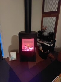 Our cosy wood heater so comfy sitting watching with a nice glass of red wine