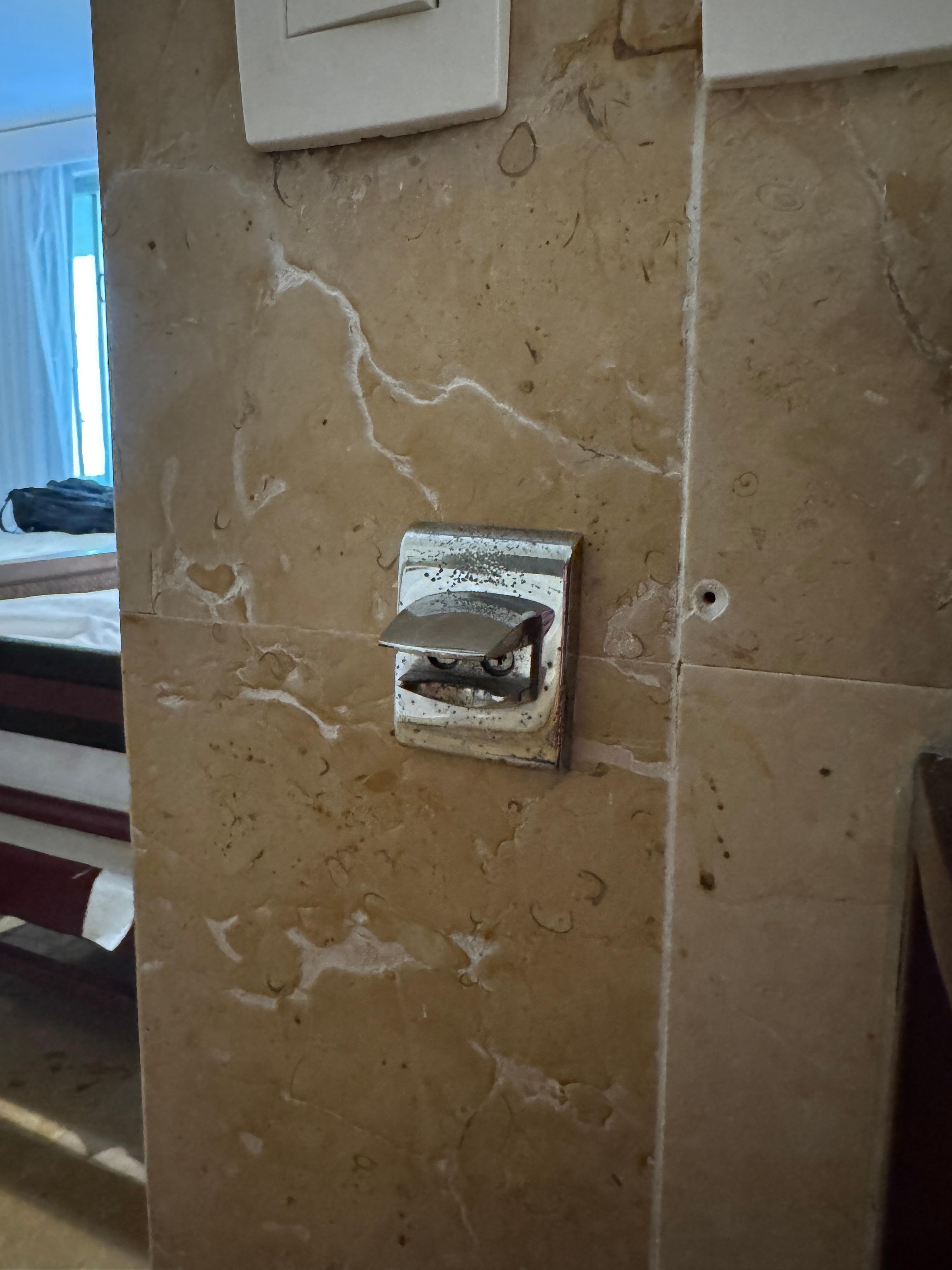 The rooms have wall-mounted beer bottle openers. Including in the bathroom!! Trash!!!!