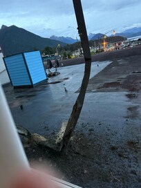 Broken drain outside our window. Look at all the crap on it and on the roof.