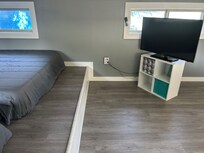 Loft tv where I hook up a Nintendo switch for the kids to play