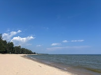 The beach about a 10 min walk to the right when you exit the house.