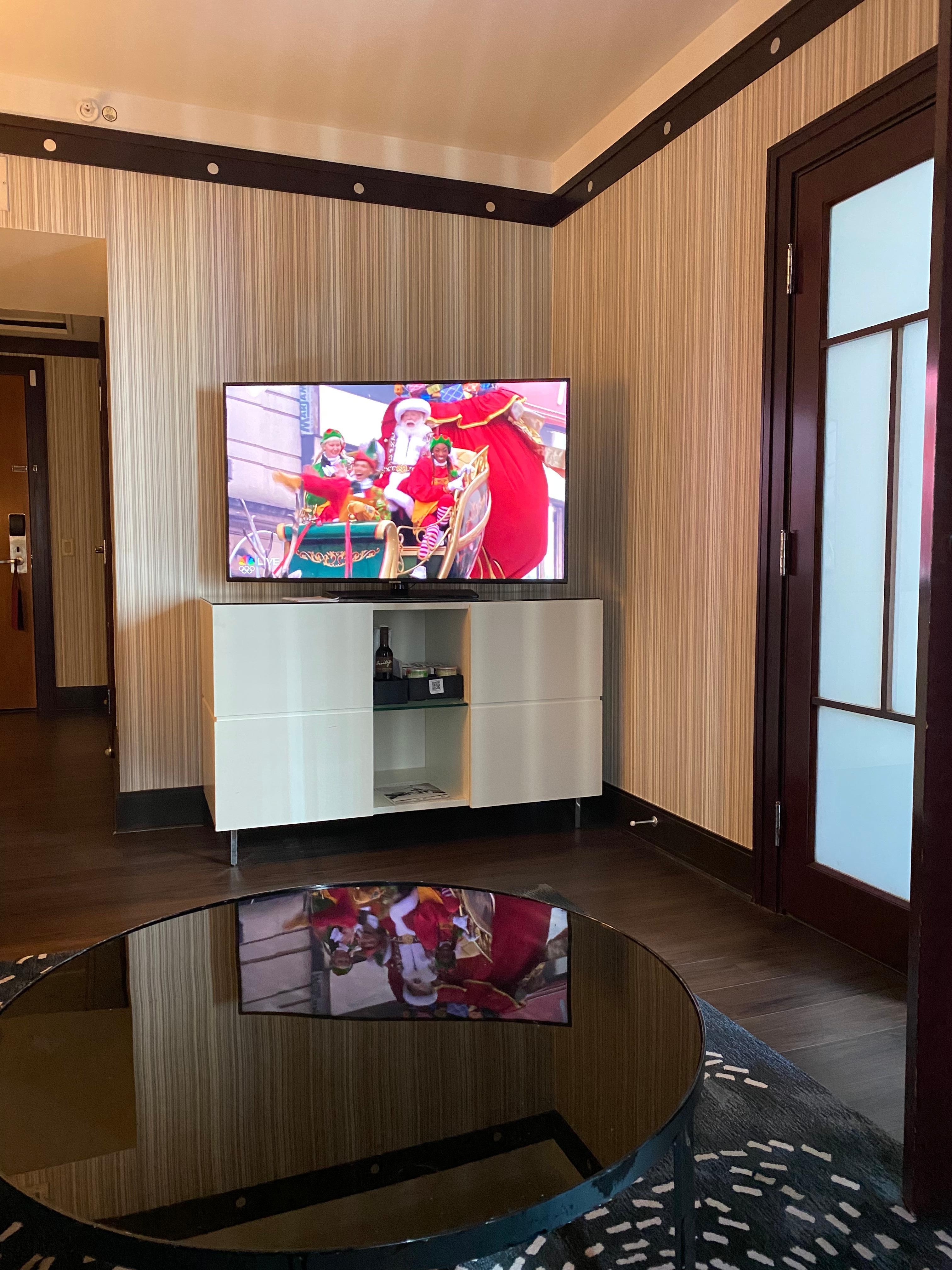 Macy’s parade great couch and TV area in the suite