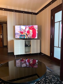 Macy’s parade great couch and TV area in the suite