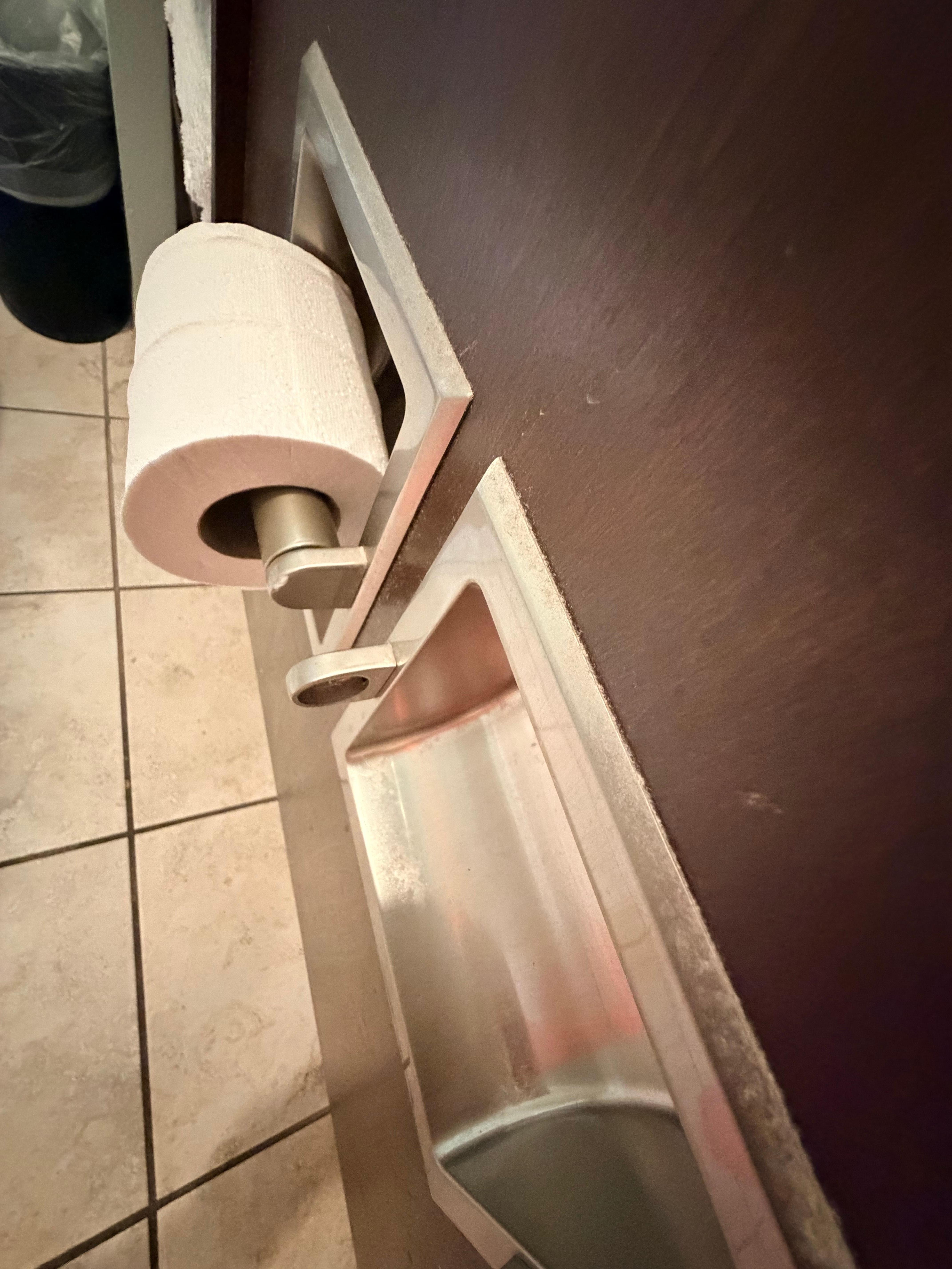 Missing toilet paper roll and disgusting 