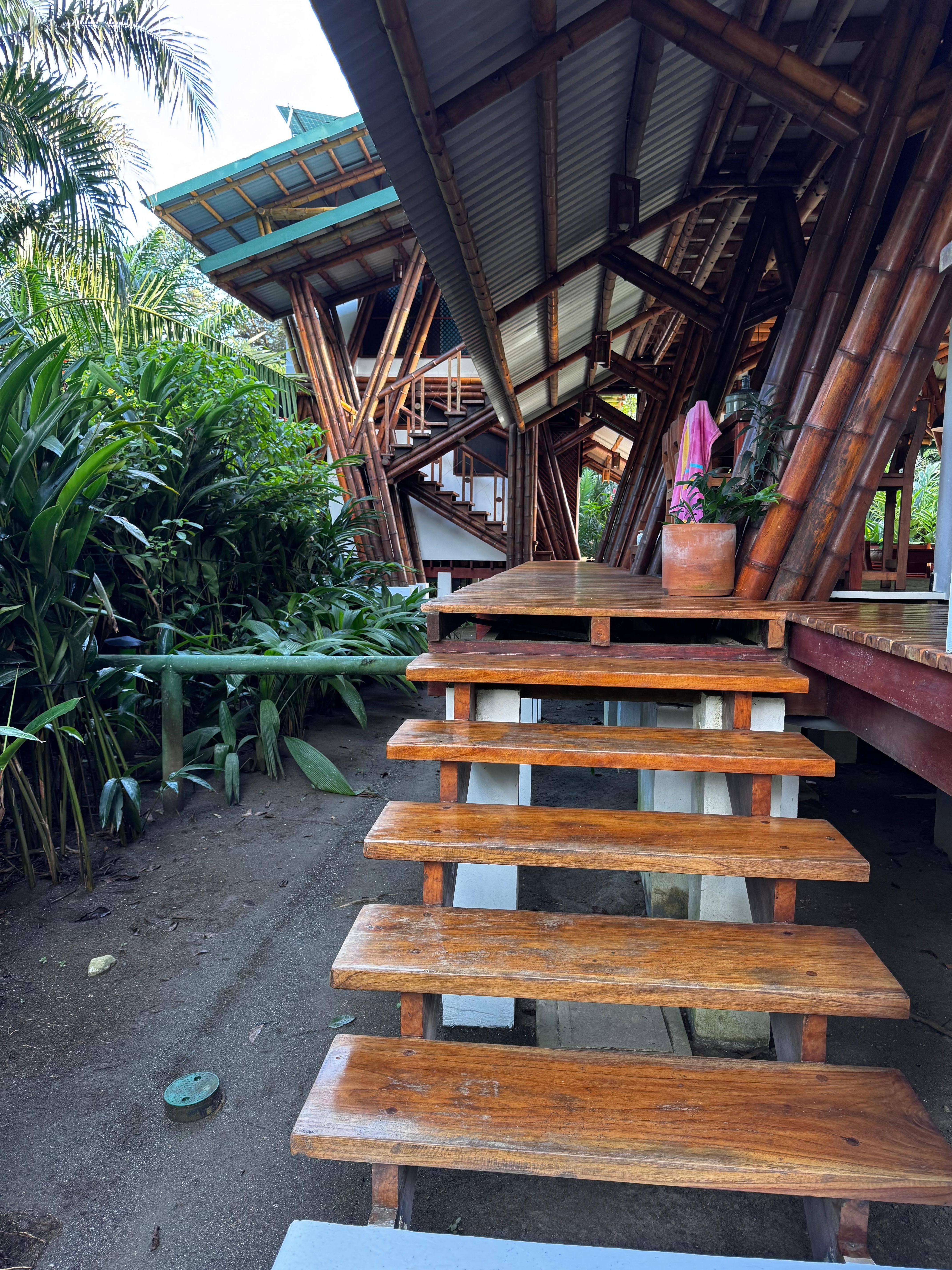 The long walkway behind the kitchen, dining, living areas - on the first floor.