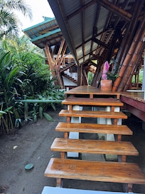 The long walkway behind the kitchen, dining, living areas - on the first floor.