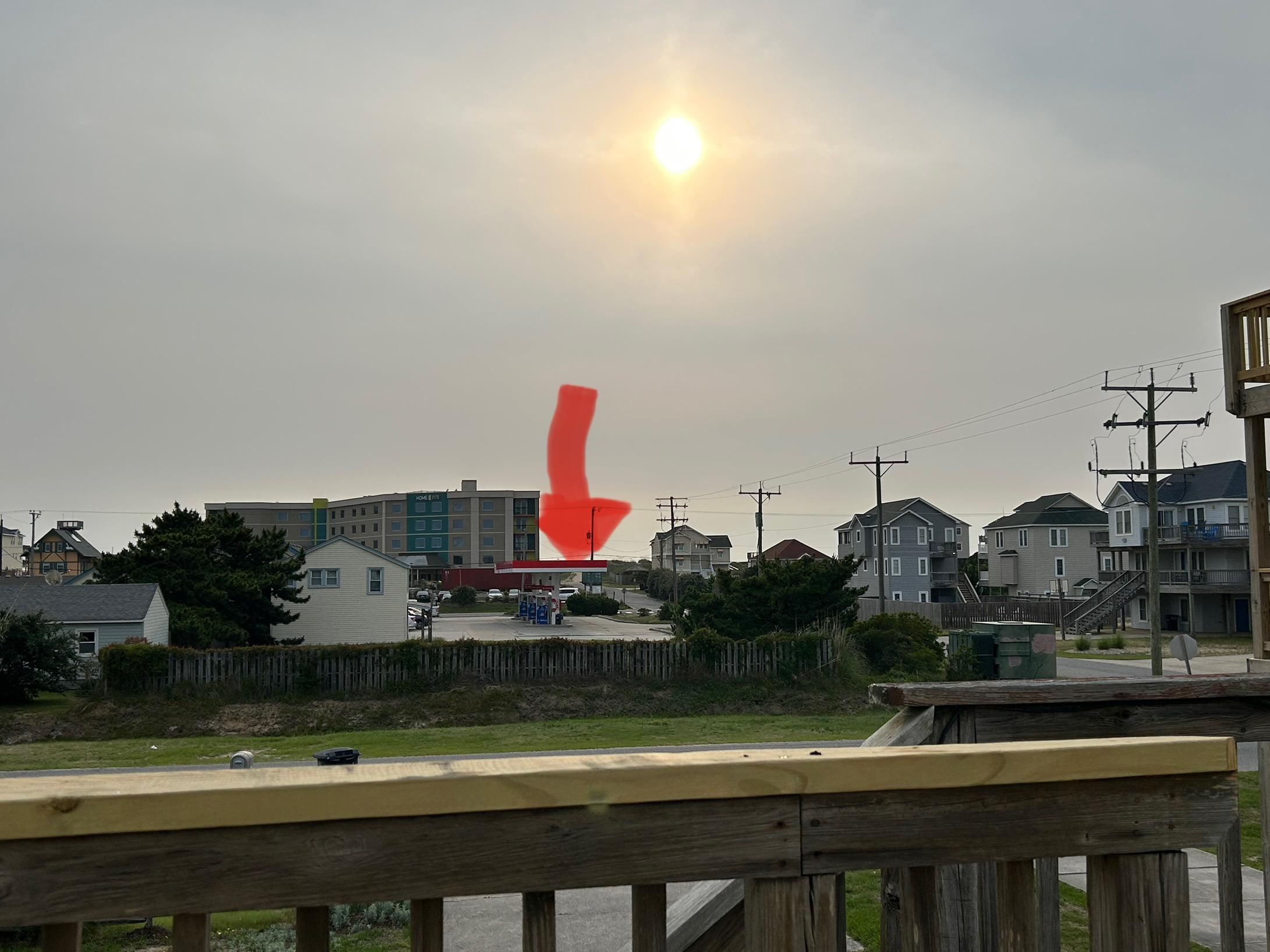 Photo taken from deck, beach access marked with red arrow.  