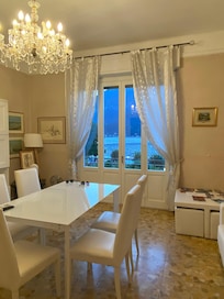 Formal dining room with balcony.