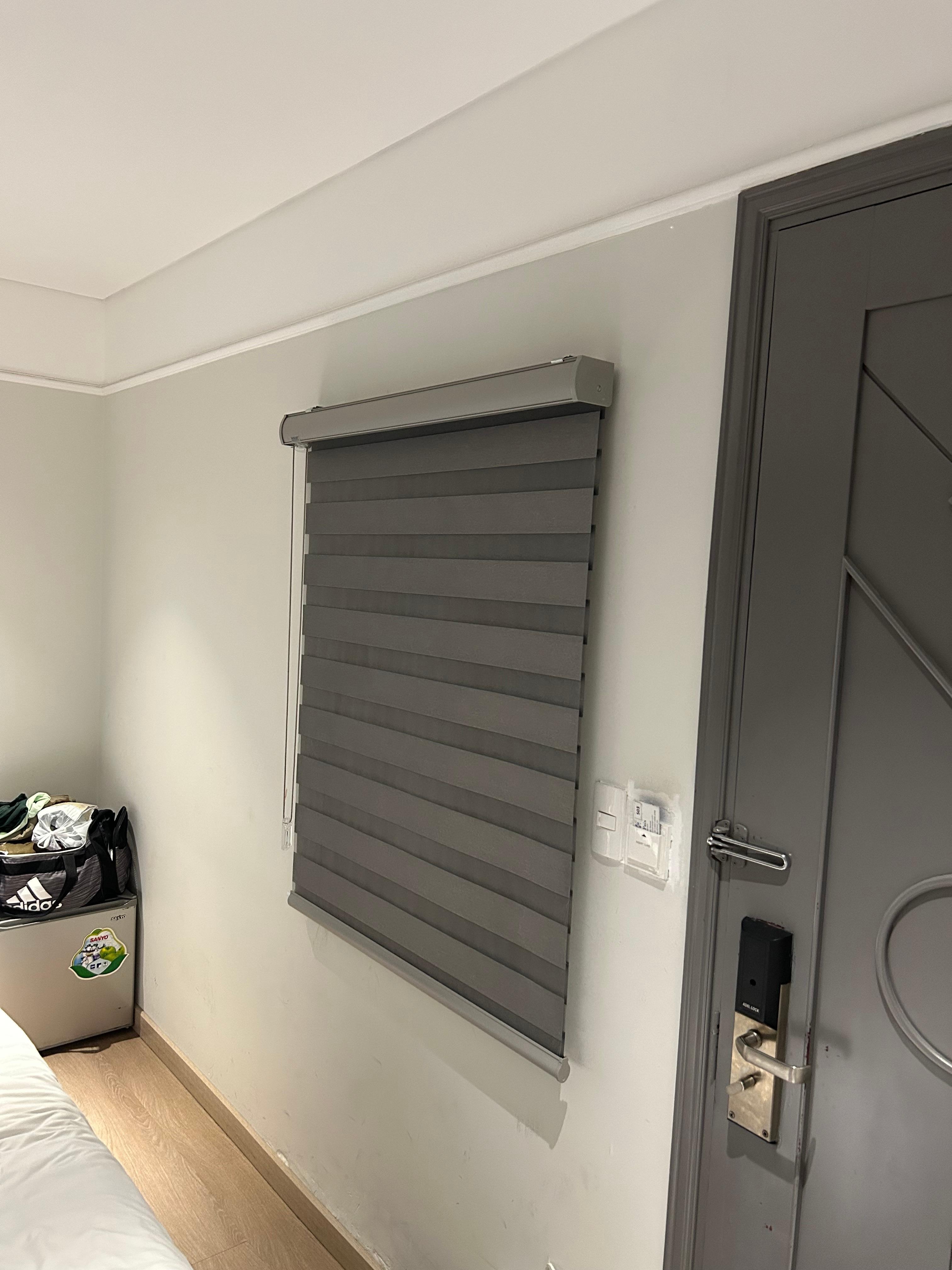 The window of my room that looked onto the hotel hallway. Also another window right outside with lots of sun. This made my sleeps terrible a. 