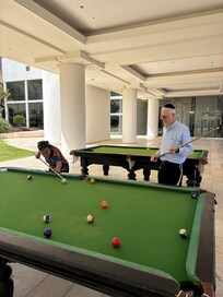 2 pool tables and a table tennis table
