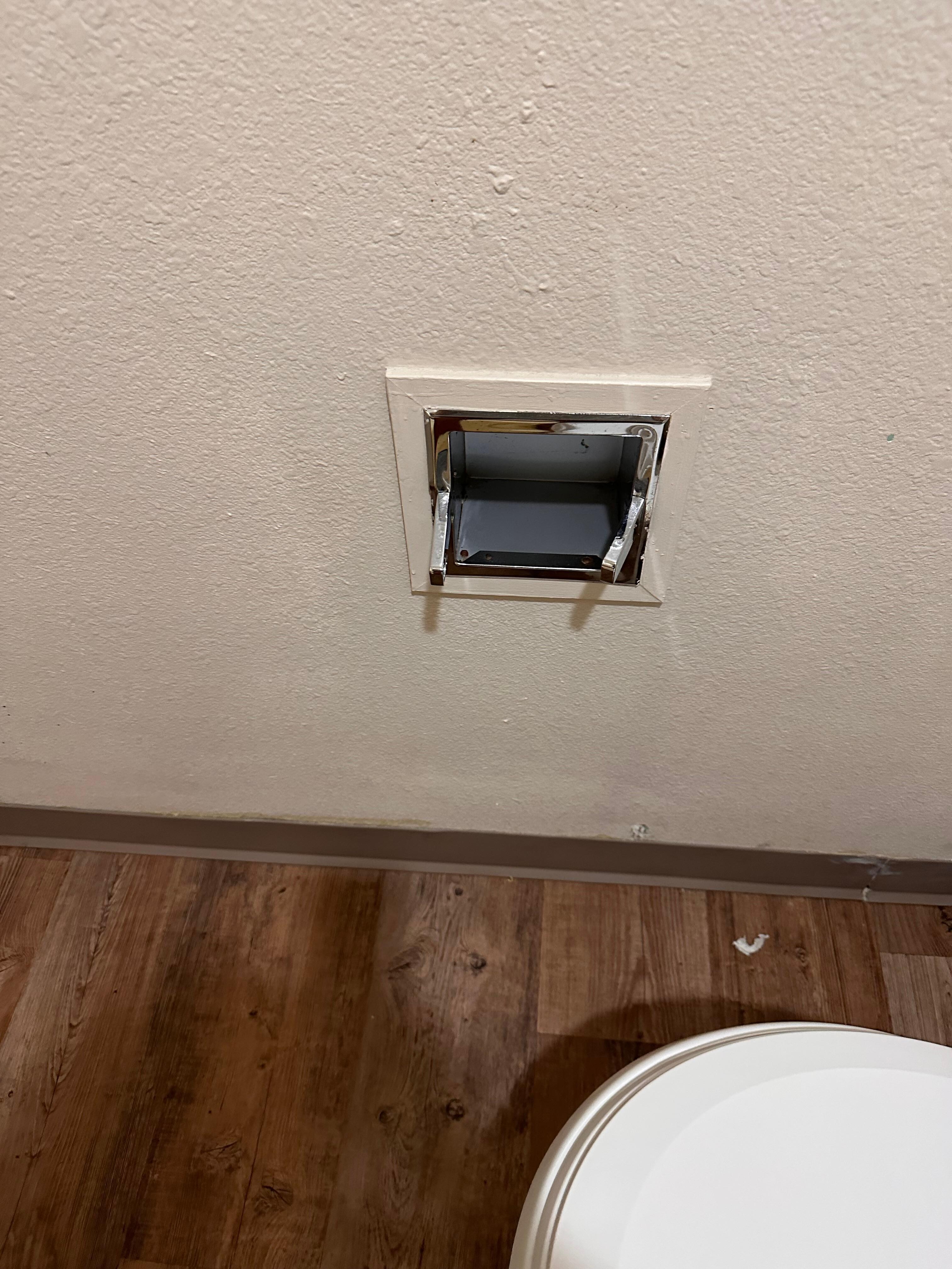 Broken Toilet paper dispenser 