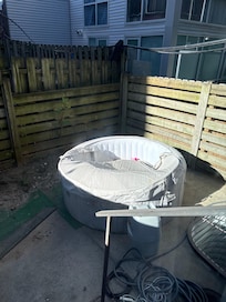 Deflated, empty hot tub