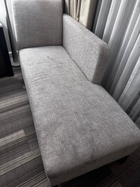 This is a very dirty chaise that they didn’t even bother cleaning. Smears and watermarks all over!