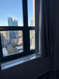 Blinds are broken and lying around.