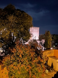 Room overlooking the castle garden at night