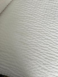 Stained bedspread