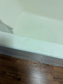 Dirty footprints on the tub