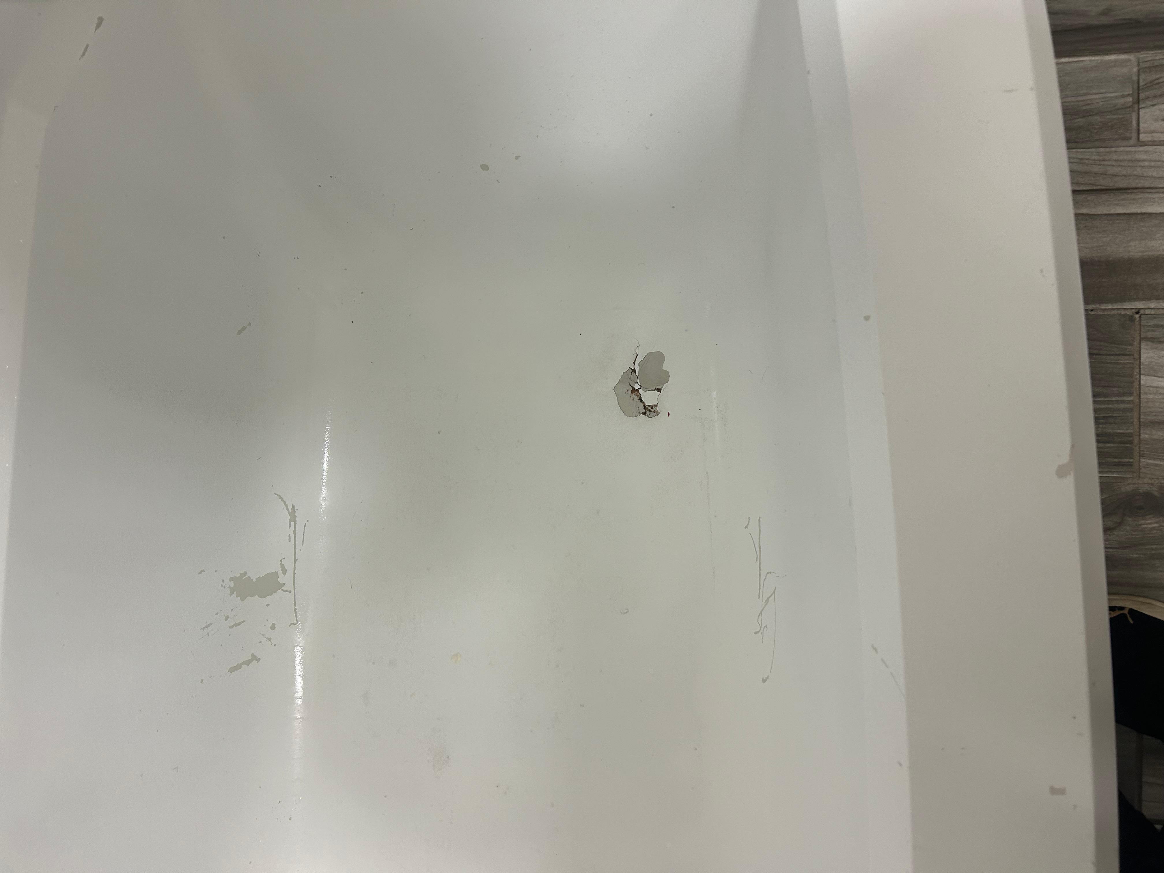 Tub had a hole in it.