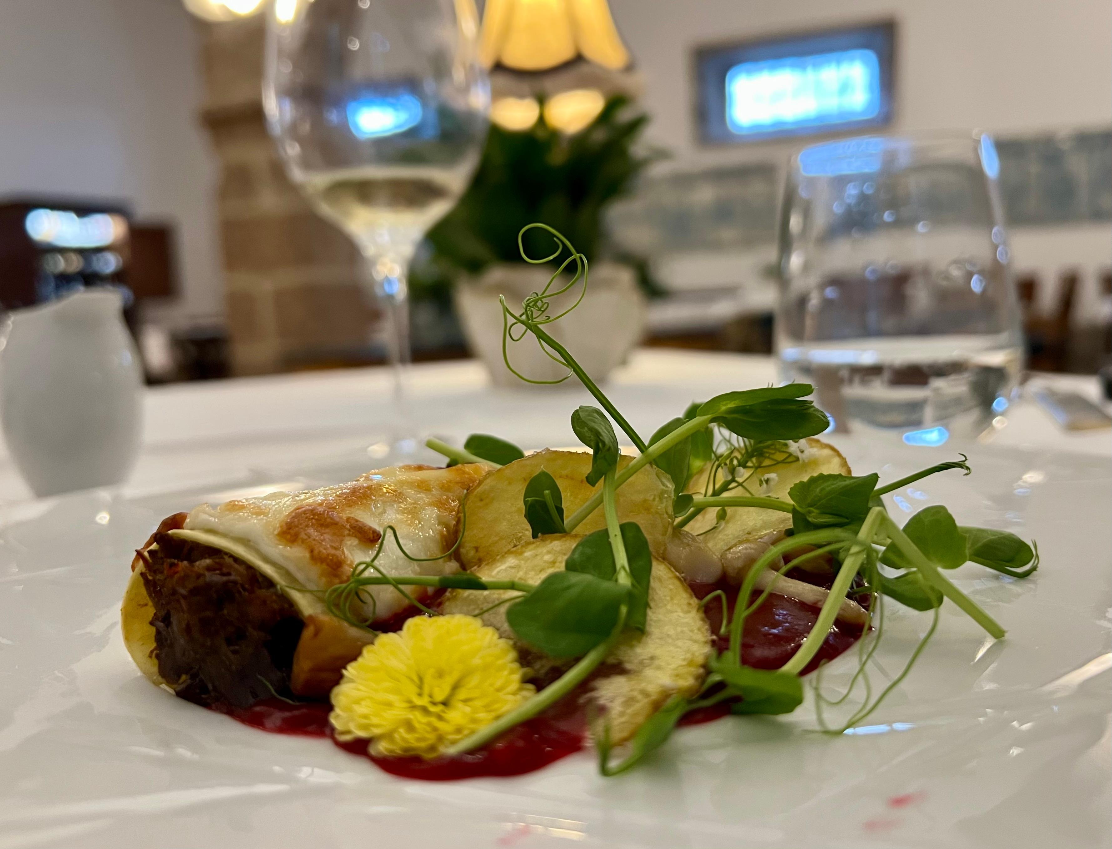 Tasty veal cannelloni's with beet sauce 