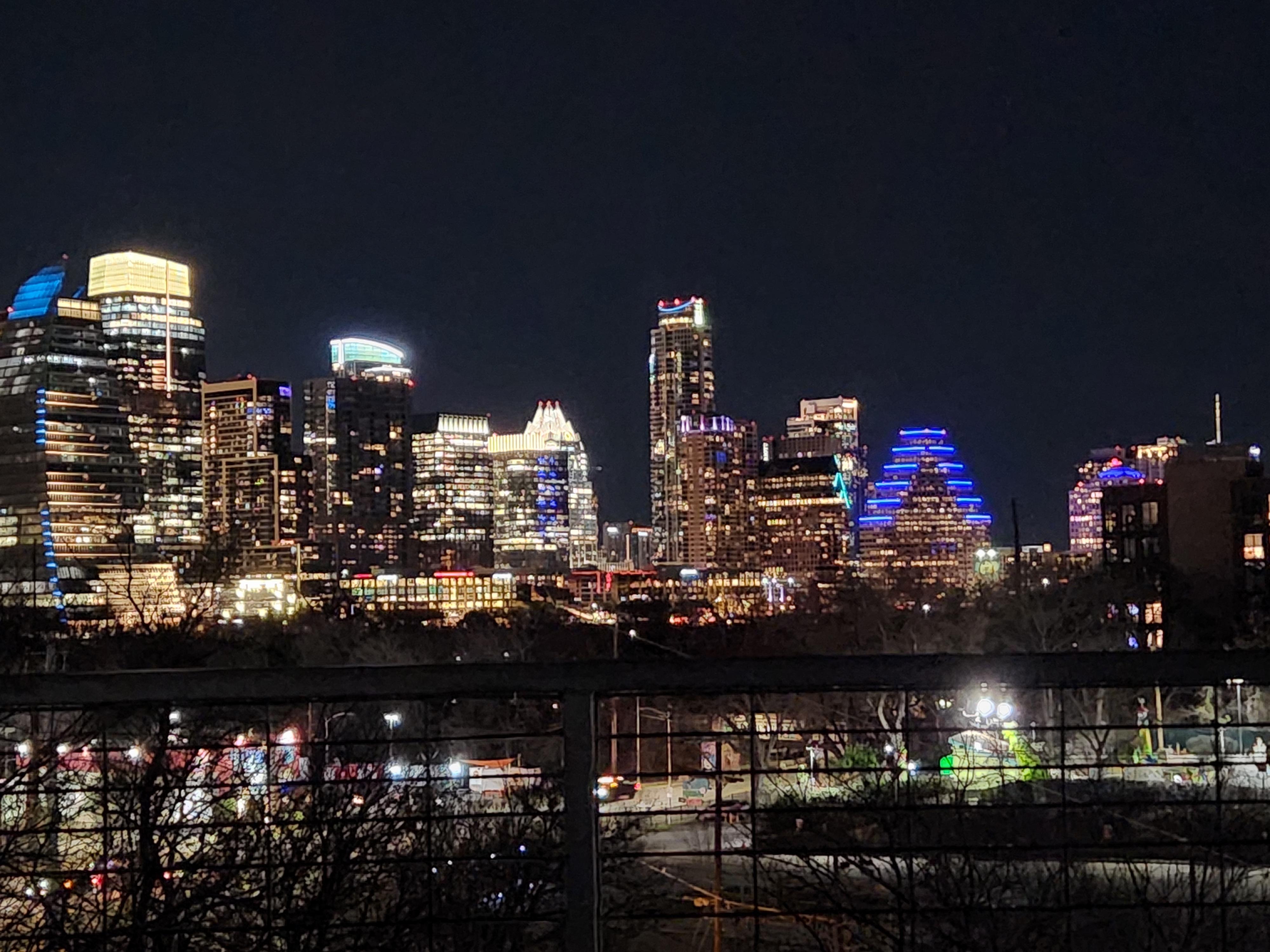 Nighttime view of Austin from the rooftop patio.