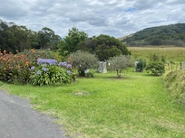 View over farmland from near front patio of cottage