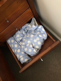 Bedroom with owner's clothing