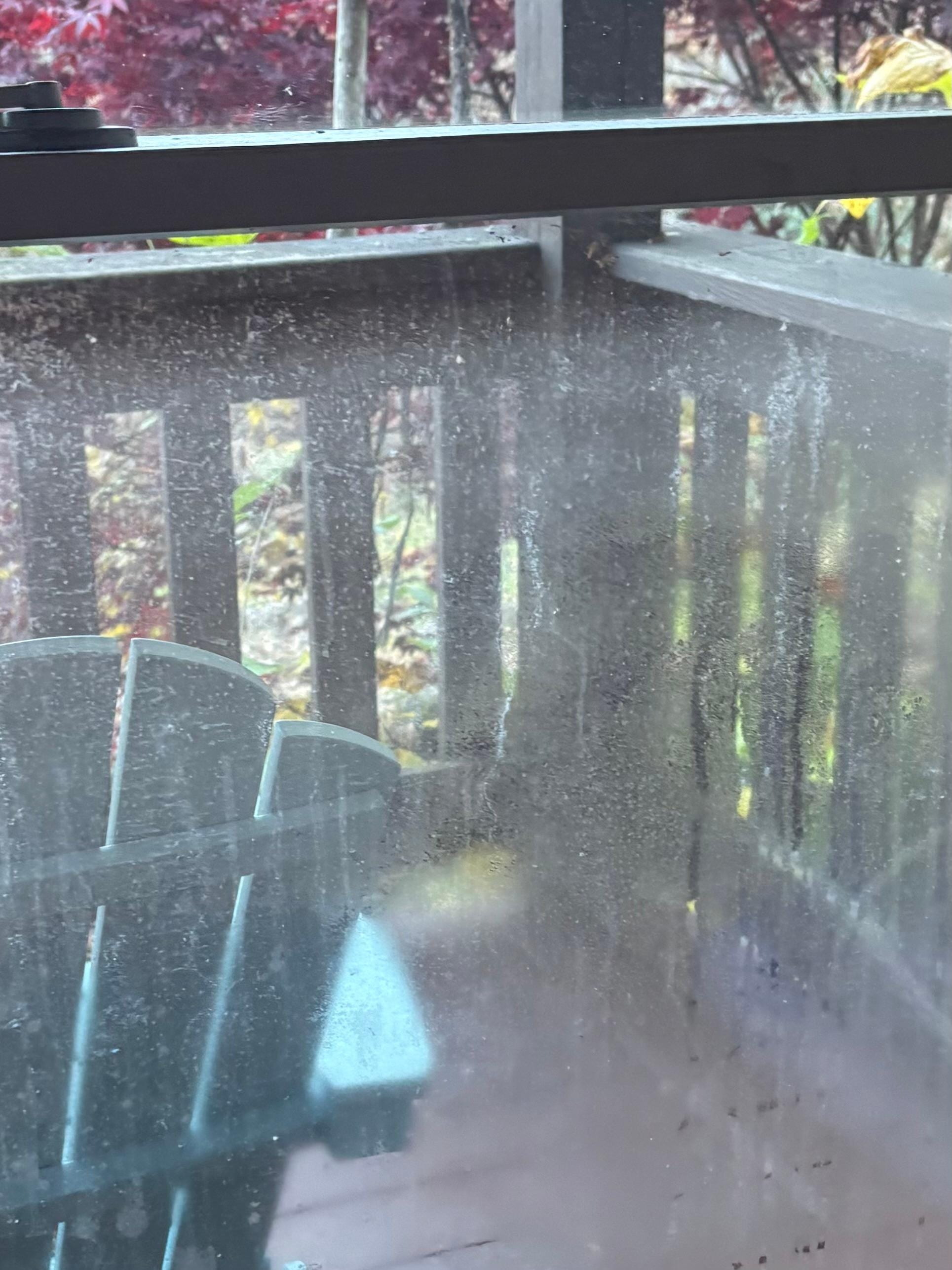 Moisture between panes of window. 