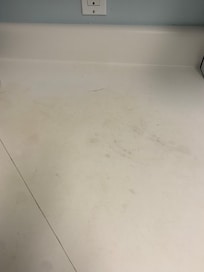 Stained kitchen countertop.