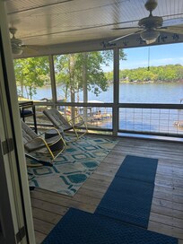 Gorgeous screen in porch looking out over the water. May be the house’s best feature.
