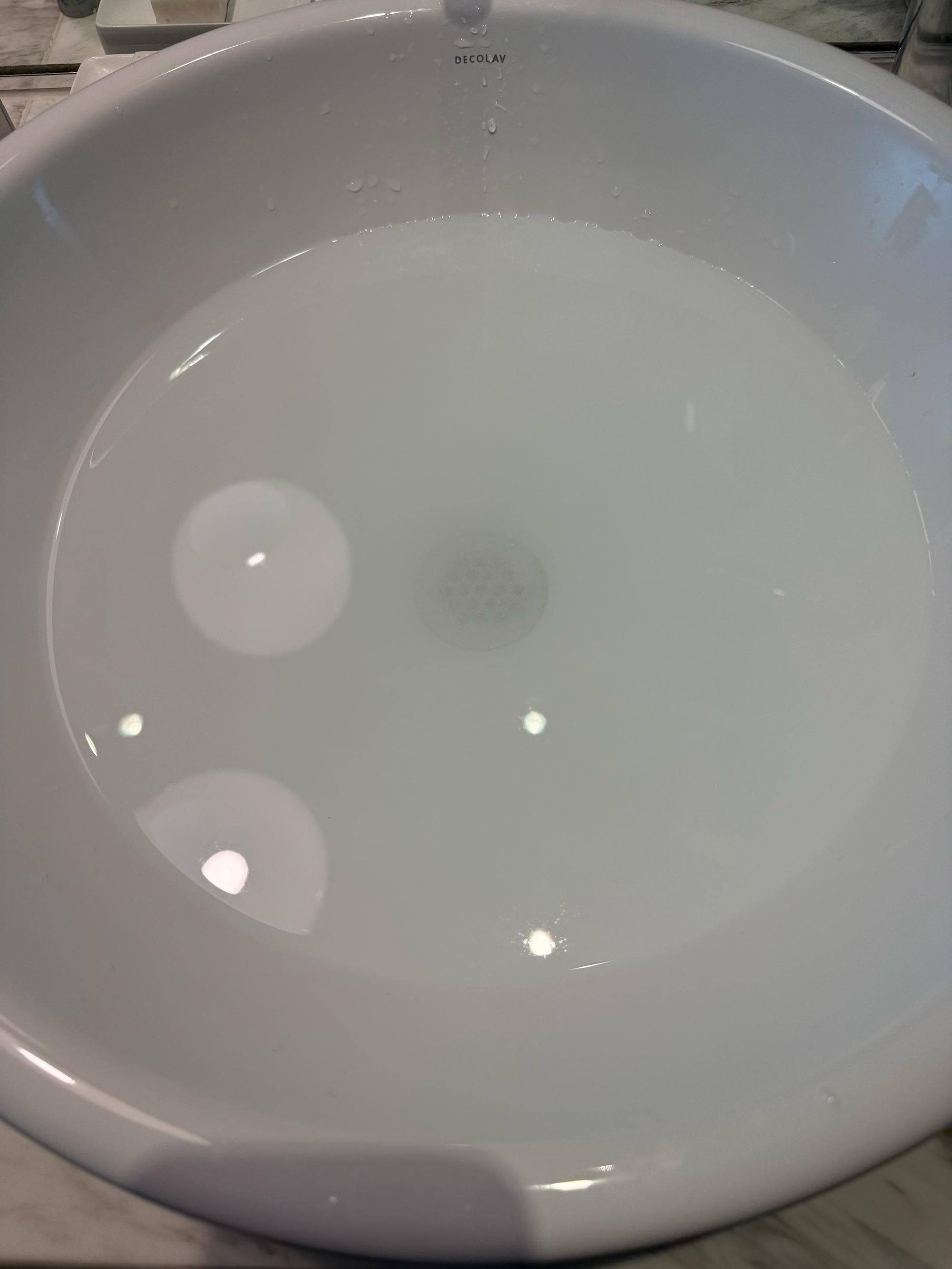 Clogged, slow draining sink. 