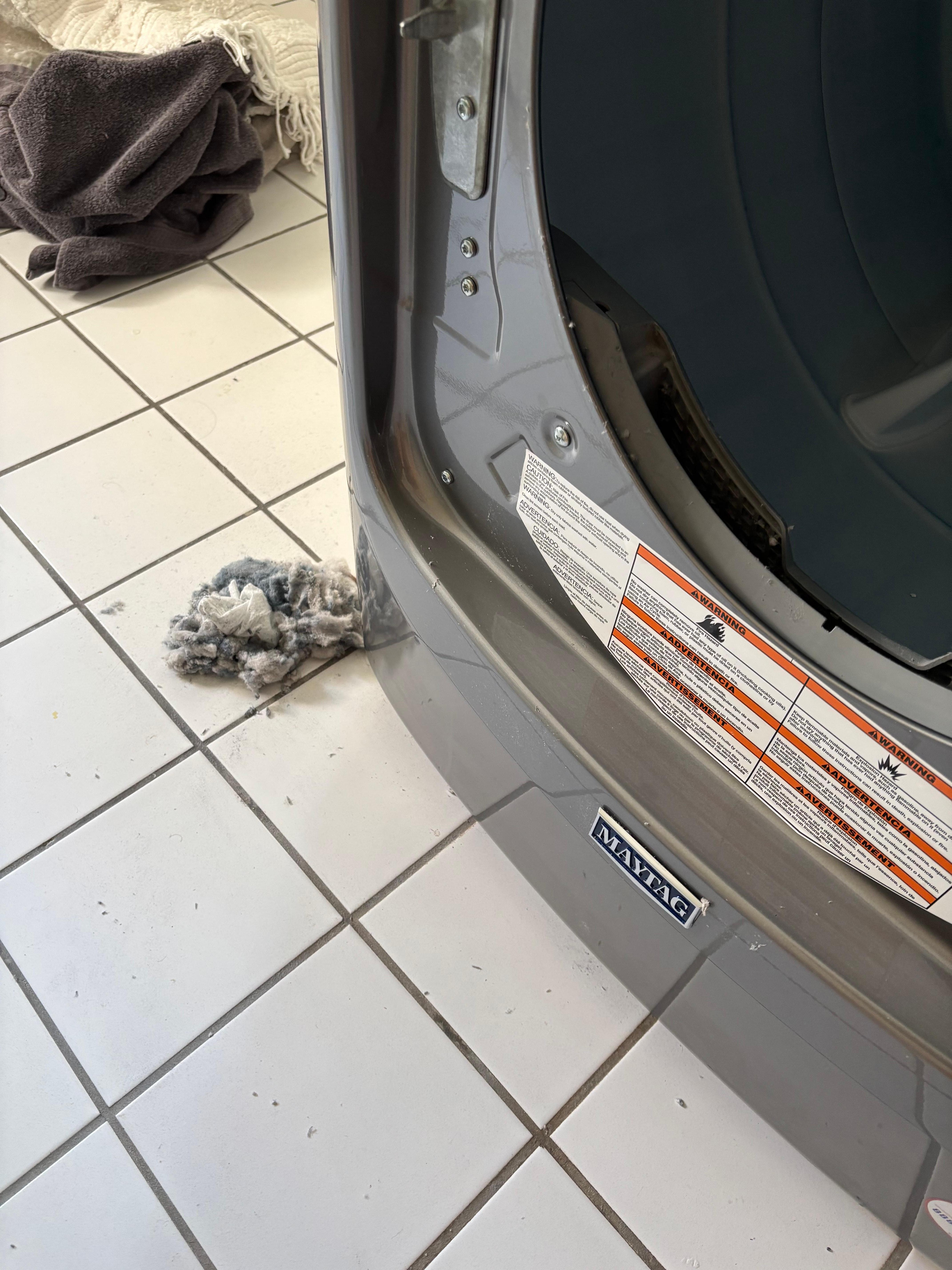 Lint trap was overflowing and backed up into exhaust hose